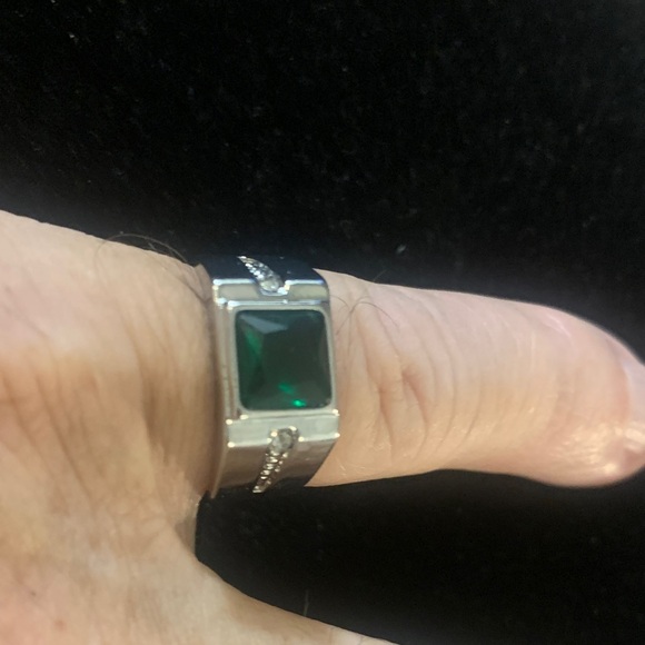 Jewelry - Silver tone ring with green synthetic gem
